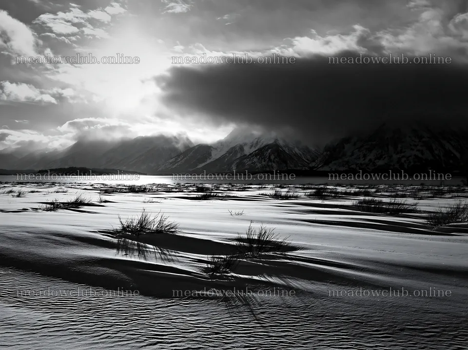Snowy lakeside meadow with mountains and clouds – meadow photos 9174x6866