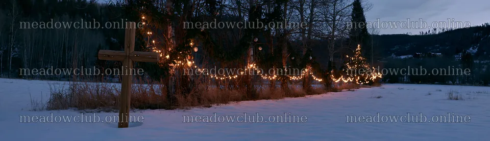 Rustic Christian cross lit up in a winter meadow setting – meadow photos 14762x4268