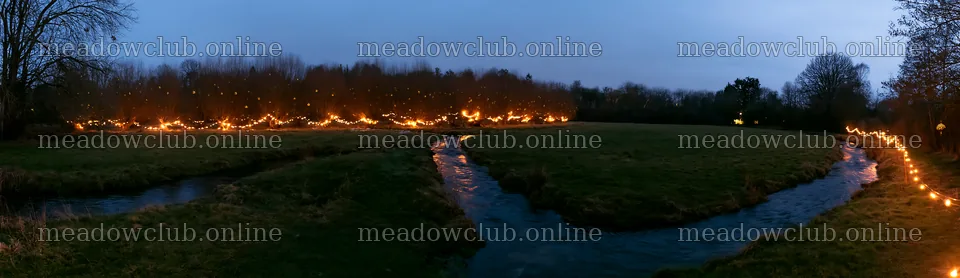 Christmas lights at dusk beside stream in meadow – meadow photos 14762x4268