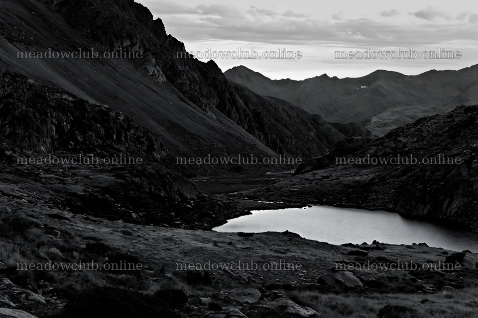 Celestial meadow lake at dusk surrounded by mountain ranges – meadow photos 9722x6480